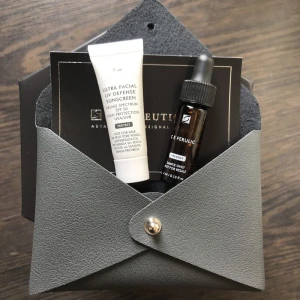 Set Mini Skinceuticals Serum CE Ferulic và Kem Chống Nắng Kèm Túi Da Xinh Xắn