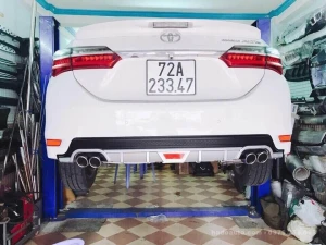 Lip chia pô Toyota Altis mẫu pô tròn