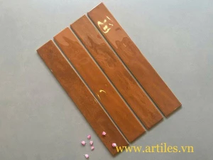 Gạch thẻ bóng lượn màu cam đất 60x400mm